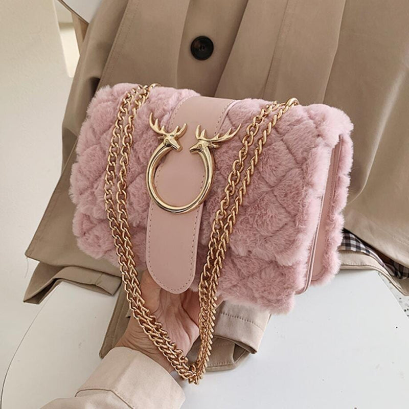 Le Sac à Bandoulière Moumoute Rose  